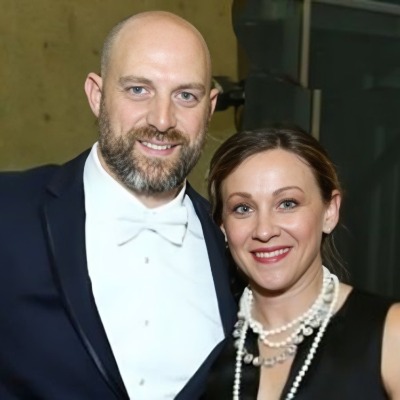 Matt Nagy and Stacey Nagy well-dressed for an event.